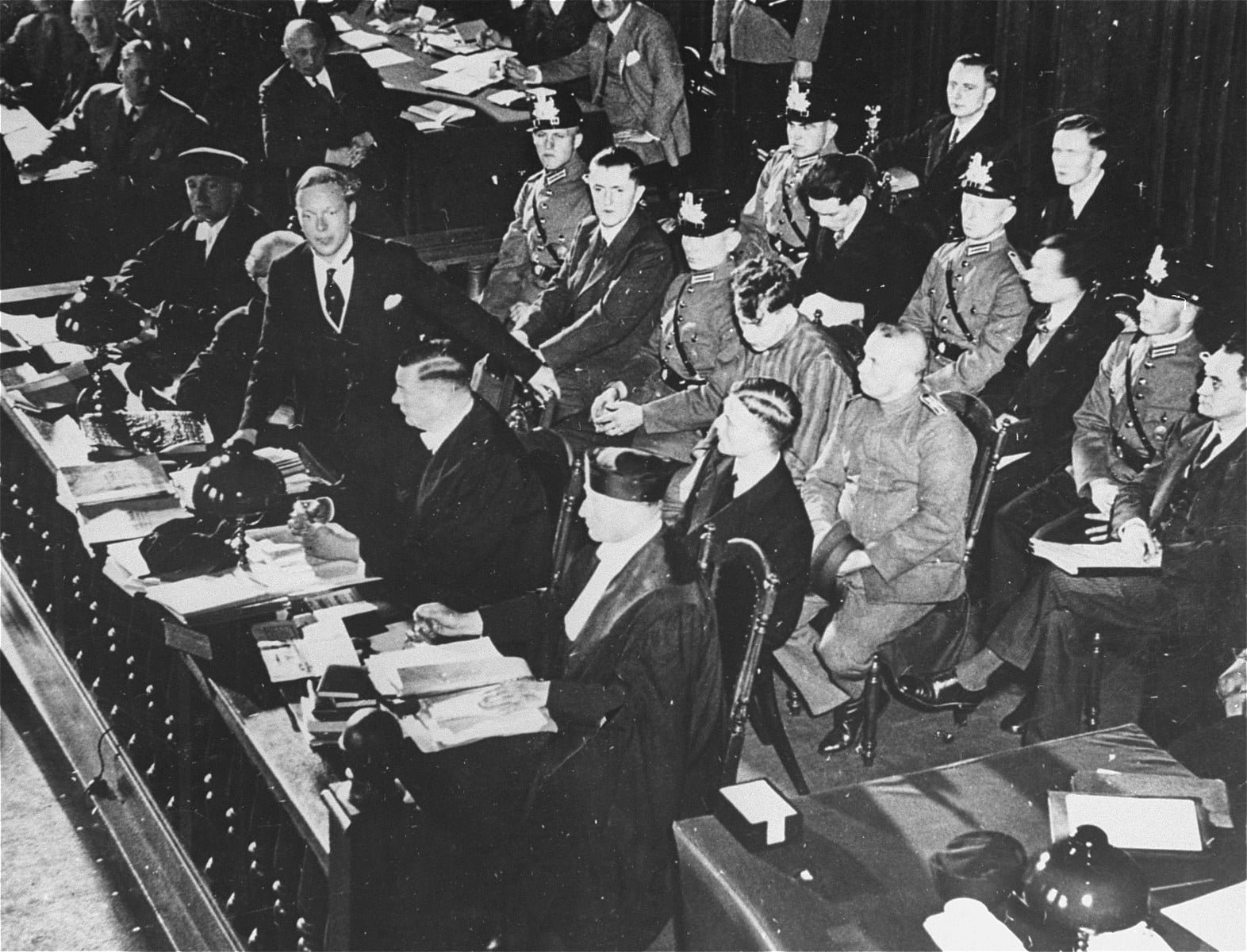 The Reichstag fire trial defendants - the defendants Ernst Torgler and Marinus van der Lubbe (second row); and Blagoi Popov, Vassili Tanev, and Georgi Dimitrov (third row)